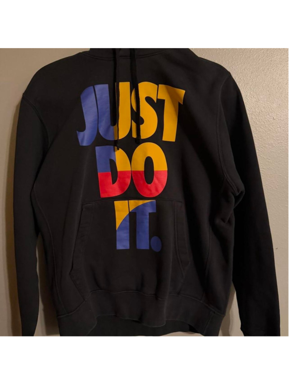 Nike Just Do It graphic pullover hoodie in black, size Medium